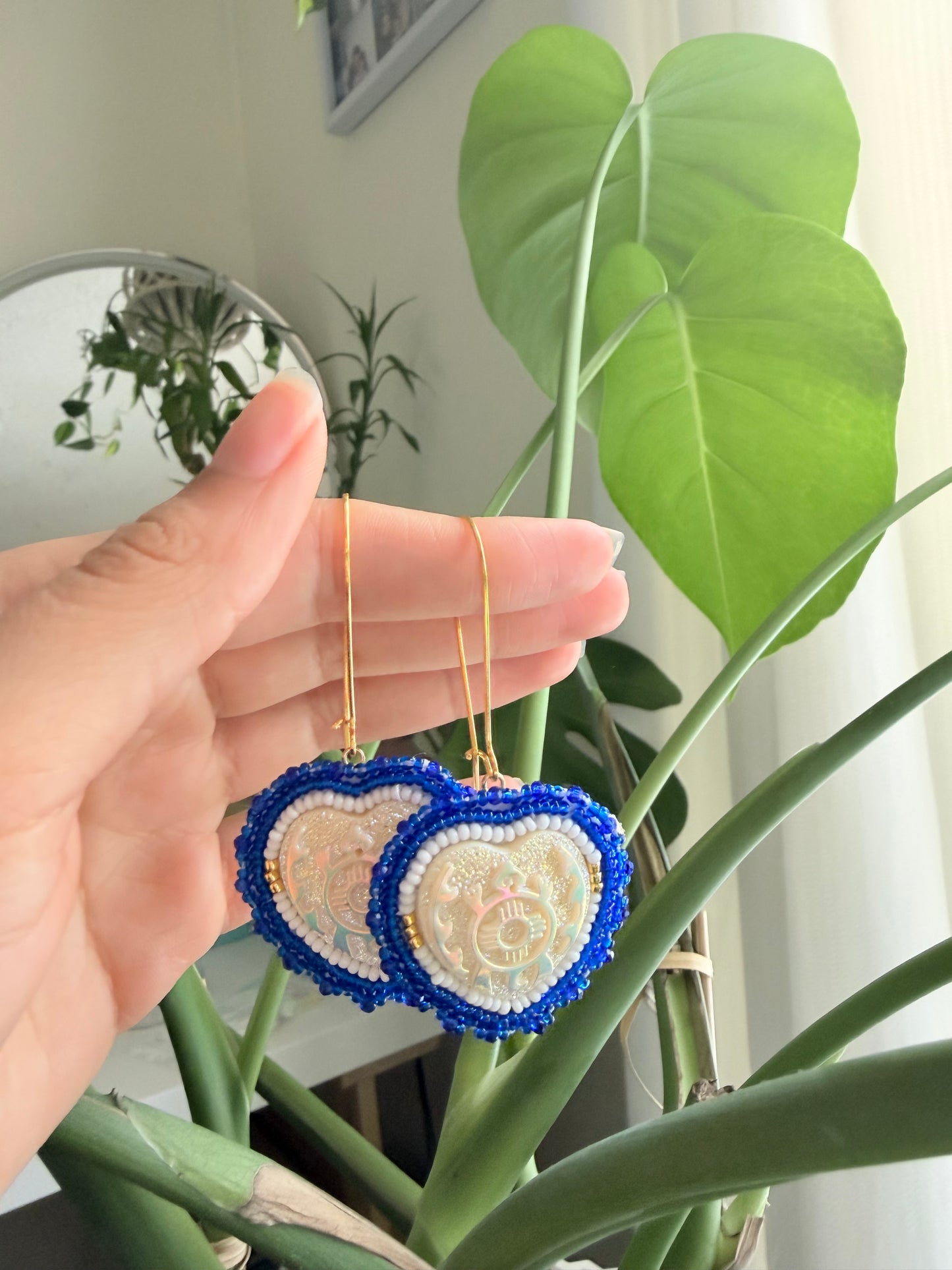 Pearlescent white turtle earrings